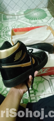 Nike Air Force 1 black metallic gold